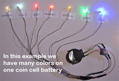 Different colors micro LEDs on one coin cell battery