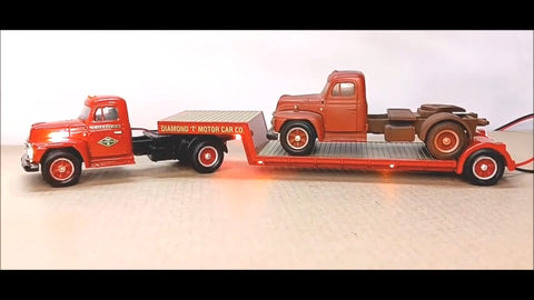 1952 Diamond T T620 with low boy trailer