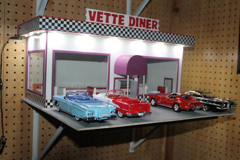Cars in front of a diner