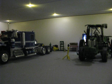 Farm tractors in garage