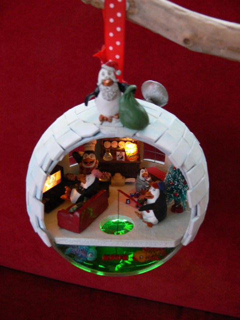 Penguins in the Christmas bauble