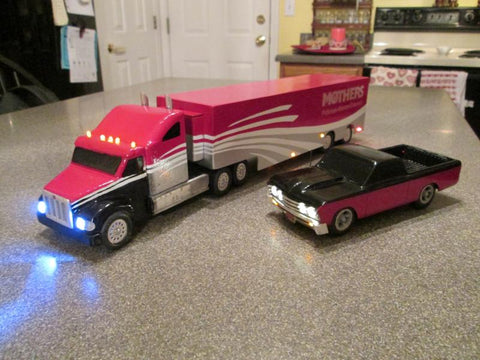 Pink truck and car