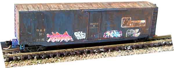 model train with graffiti